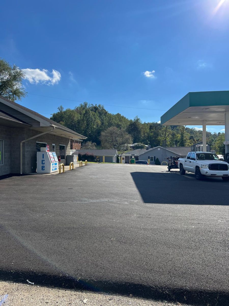 Store and fuel canopy seen across the parking lot